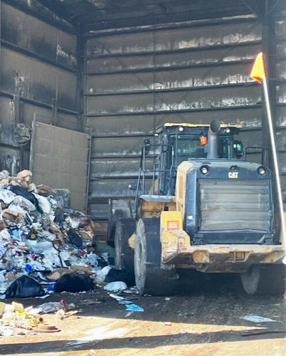 Pushing garbage at Meeker County