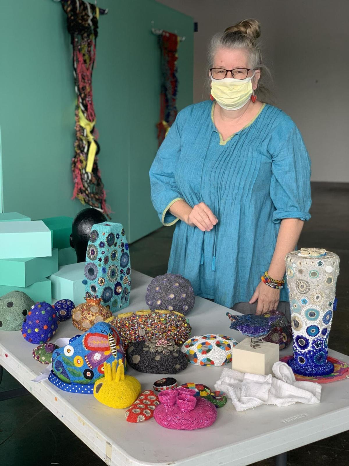 Chris Allen with a variety of her work