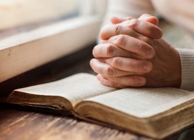 Praying over Bible