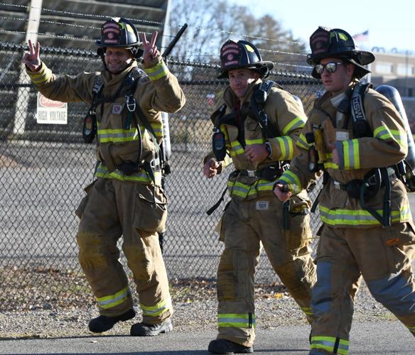 Firefighters sprinting