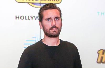 Scott Disick is trying to 'stay out of trouble' following Kourtney Kardashian's wedding