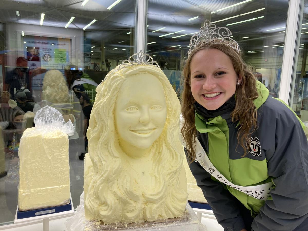 Posing with her scupture