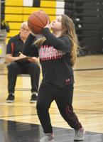 Youths hit free throw line at hoop shoot