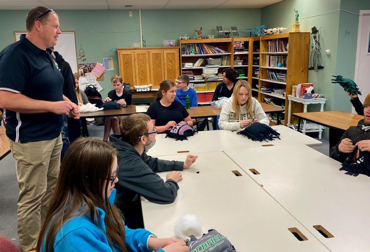 Jim Jackman talks with students