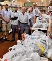 Letter carriers Stamp Out Hunger